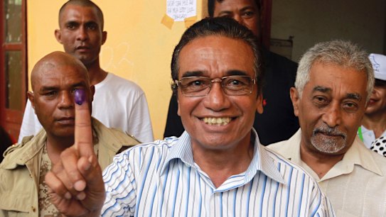 Fretilin leader Francisco "Lu-Olo" Guterres, front, after voting. 