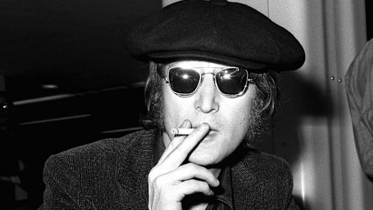 (FILES)  This file photo dated 14 July 1971 shows former Beatles John Lennon, who was murdered outside his home in New York in December 1980.   The 20th anniversary of John Lennon's death was being commemorated 08 December, 2000, with a blue plaque unveiled at his suburban childhood home in Liverpool.   Lennon lived at the small semi-detached house in Woolton, Liverpool, from the age of five until 1963, when the 23-year-old achieved worldwide fame with the Beatles.   AFP PHOTO   BW ONLY squiz