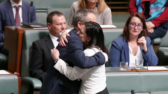 Opposition Leader Bill Shorten hugs Emma Husar after her speech.
