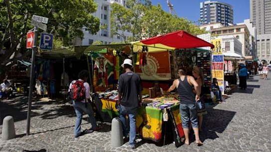 Market leaders ... browsing at the Green Market in Cape Town.