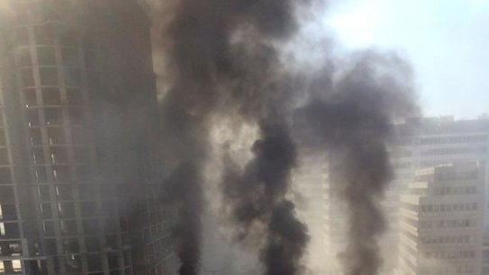 Shattered: Palls of smoke rise from the scene of the attack, which occurred in a part of downtown Beirut some Lebanese saw as a symbol of the country's rebirth.