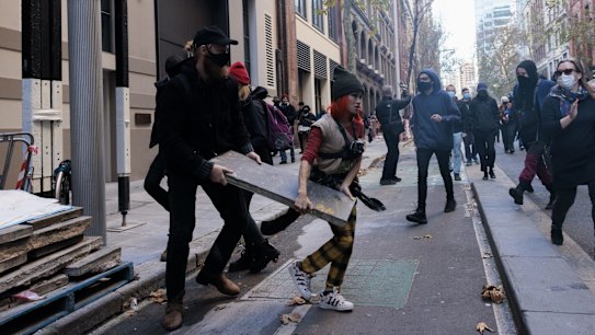 Blockade Australia climate change protestors swarm the CBD.