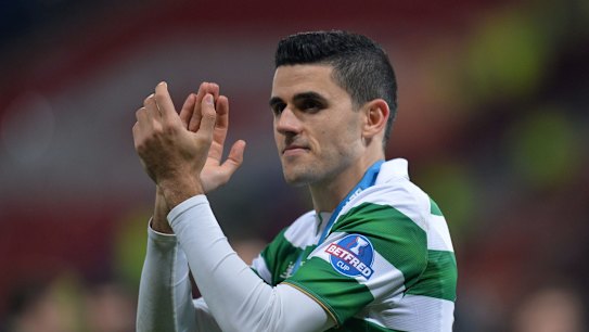 Tom Rogic scored an extra time winner to spur Celtic to Scotland's third domestic glory of the season.