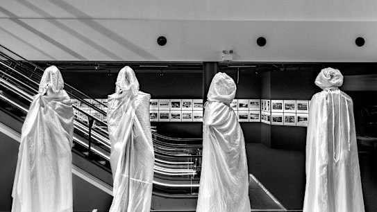 Fashion on mannequins which have been covered and protected from dust and sunlight in the Powerhouse Museum, Utimo.

