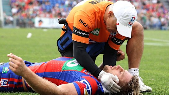Brendan Elliot was motionless after receiving a head knock against the Rabbitohs.