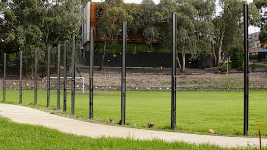 The large fence along Alphington Grammar on the Darebin Yarra Trail.