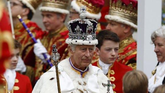 King Charles III departs the Coronation service at Westminster Abbey on May 06, 2023 in London, England. 
