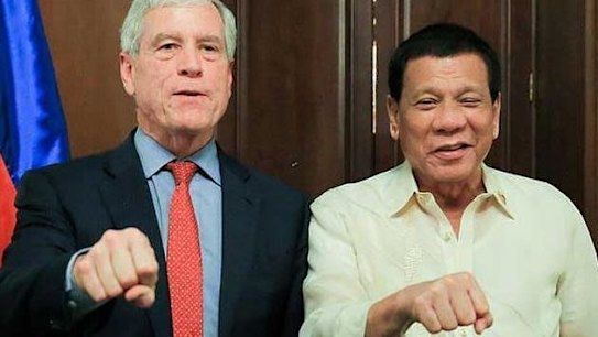 Australia's spy chief Nick Warner with Philippine president Rodrigo Duterte in Manila. 