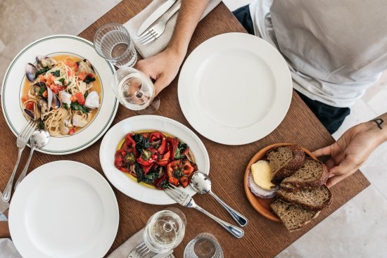 Spaghetti, clams and tomatoes with charred peppers and Berkelo sourdough country loaf. 