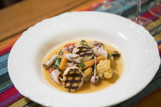 Go-to dish: Scallops, grilled calamari, and mussels with vegetables a la grecque.