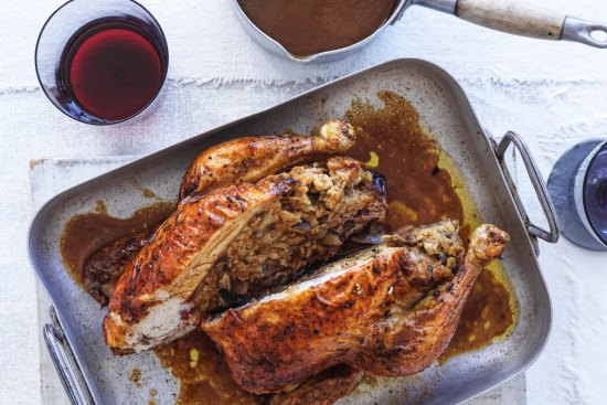 Roast chicken with bacon and mushroom stuffing and red wine gravy.