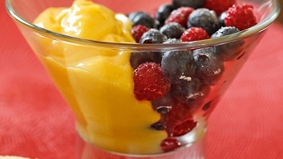 Sugared berries with passionfruit curd
