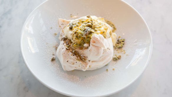 Pistachio pavlova with passionfruit and yoghurt cream.