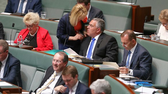 Chief government whip Nola Marino in discussion with former treasurer Joe Hockey during question time on Monday.