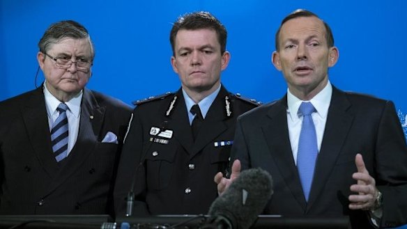 Prime Minister Tony Abbott on Friday, with ASIO Director General David Irvine and AFP Commissioner Andrew Colvin.