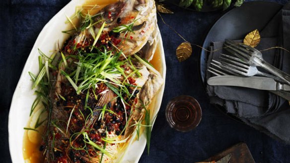 Barbecued snapper with black beans and salted chillies.