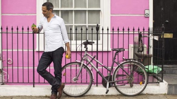 Yotam Ottolenghi outside his test kitchen in Camden Town, London. The kitchen doubles as an office and is the heart of his enterprises.