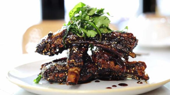 Crispy lamb ribs tossed in a sticky plum sauce.