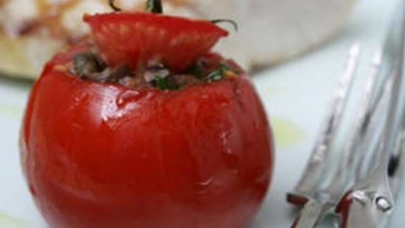 Stuffed tomatoes and grilled kingfish