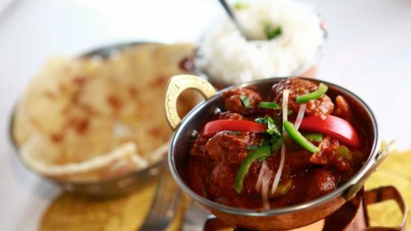 Lamb curry with naan cooked fresh in the tandoor.