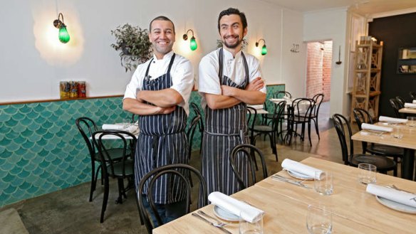 Chefs Coskun Uysal and Murat Ovaz inside Tulum Turkish restaurant.