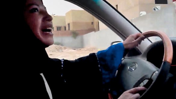 June 2011: a Saudi Arabian woman drives a car in the capital Riyadh in defiance of the kingdom's prohibition.