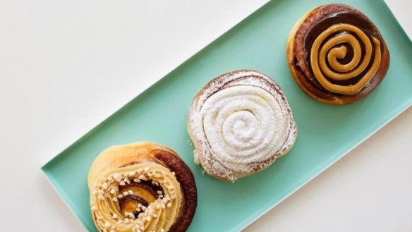 Swirly delights: Scrolls include the 'original' with cinnamon and cream cheese (pictured centre).