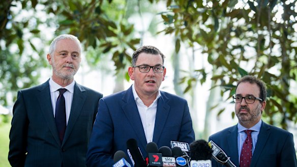 Premier Daniel Andrews flanked by Gavin Jennings and Martin Pakula 