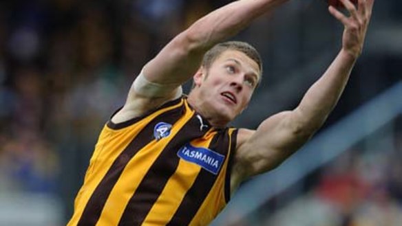 Travis Tuck takes a mark against Brisbane in season 2009.