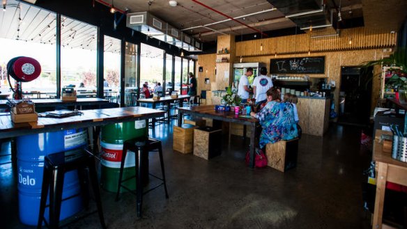 Chilled-out burger bar: Beef & Barley features colourful oil-drum table supports.