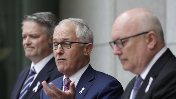 Prime Minister Malcolm Turnbull addresses the media during a joint press conference with Finance Minister Mathias Cormann and Attorney-General George Brandis on Tuesday. 