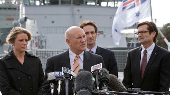 Keneally and Macdonald ... facing damning claims about airfare expenses.