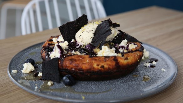 Buttermilk hotcake with shards of blueberry 'leather'.