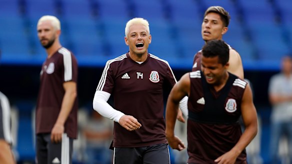 Relaxed and ready: Mexico players train before their clash against Brazil.