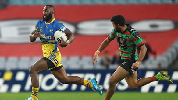 On the run: Semi Radradra breaks away to score a try during the round 15 NRL match between the South Sydney Rabbitohs and the Parramatta Eels at ANZ Stadium on Friday.