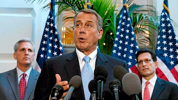 House Speaker John Boehner speaks to the media following a House Republican caucus meeting at the US Capitol.
