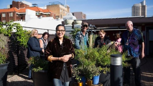 Kylie Kwong and the Wayside community in the rooftop garden of Wayside Chapel.