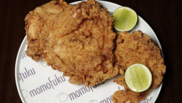 Fried chicken breast is served on the bone.