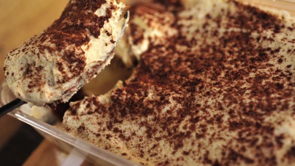 Rich and creamy tiramisu comes in a takeaway container.
