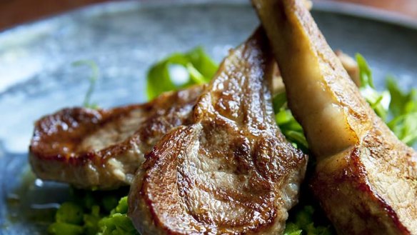 Minted peas with grilled lamb cutlets.