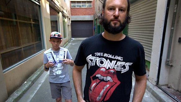 Justin Quintner, right, and his 13-year-old son Andre travelled from Darwin via Adelaide to see the Rolling Stones at Hanging Rock.