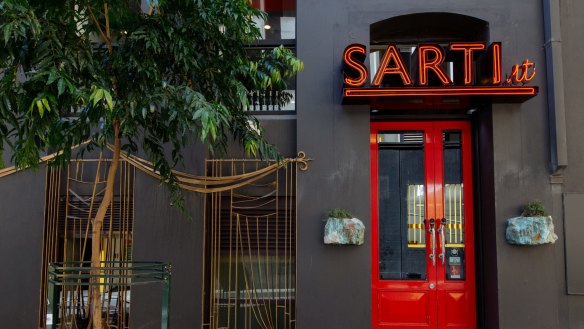 By day, city suits bound up the stairs for the well-priced three-course express lunch at Sarti. 