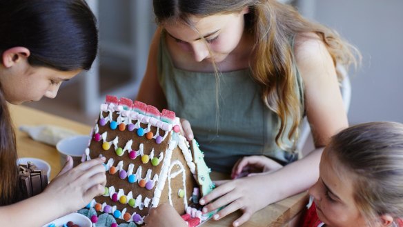 Decorating Phillippa's gingerbread house. 