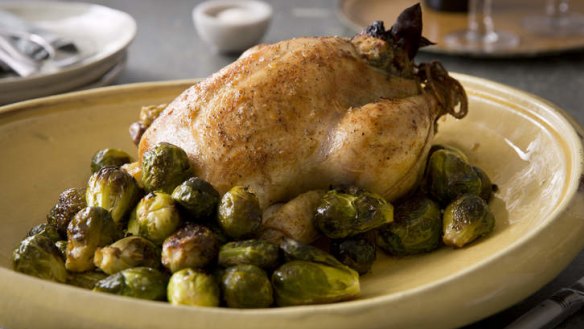 Brined and stuffed roast chicken with honeyed brussels sprouts. <b>Photo:</b> Marcel Aucar.