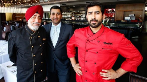 Indian summer: Father Manjit (left), with brothers Deep and Varun Gujral, at Manjit's @ The Wharf.