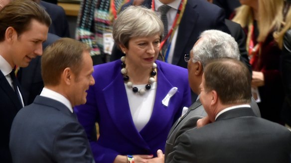 British Prime Minister Theresa May, centre, speaks with from left, Austrian Chancellor Sebastian Kurz, European Council President Donald Tusk, Swedish Prime Minister Stefan Lofven and Portuguese Prime Minister Antonio Costa in Brussels on Thursday.