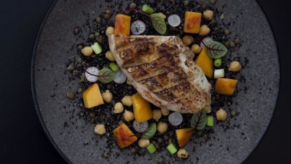 Free-range chicken breast 'al mattone' with stone fruit and dressed grains at Rawsons, Epping.
