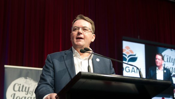 Logan Mayor Luke Smith has been automatically suspended, with pay, under laws which came into effect on Monday.