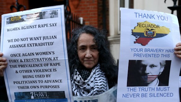 A protester outside the Ecuadorian embassy in London on Thursday. 
