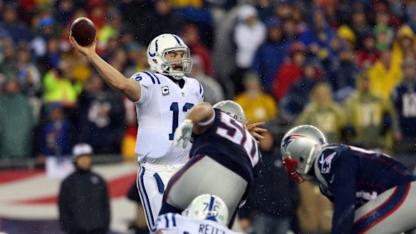 Deflated: Indianapolis Colts Andrew Luck looks to throw a pass against the New England Patriots in the 2015 AFC Championship Game at Gillette Stadium.